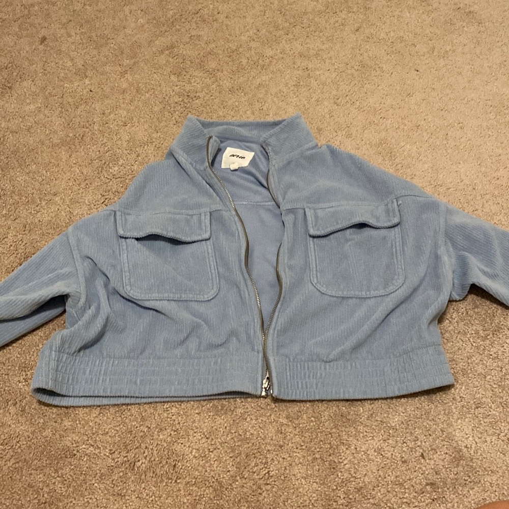 Arie, blue jacket, XL.